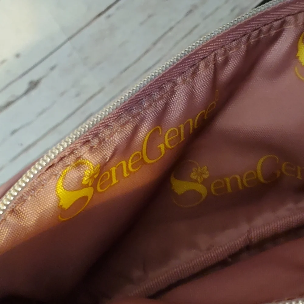 SeneGence pink vinyl makeup bag with foundation samples